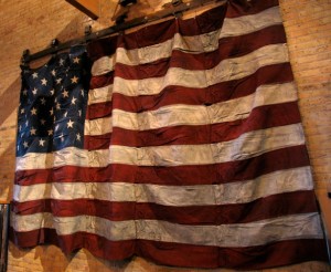 A flag made of jeans in the main gathering space (aka lobby) at the Iron Horse Hotel