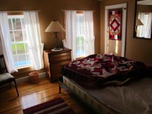 One of three cozy bedrooms