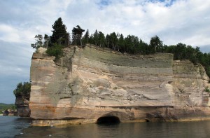 Sandstone walls rise 50 to 200 feet above Lake Superior