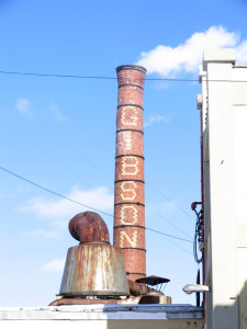 The smokestack still bears the name of the original company on site