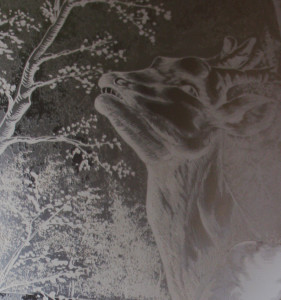 Detail from an etched glass door at Kalamazoo House B&B