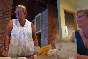 Food Dance restaurateur Julie Stanley chats with guests and foodie tour organizer Dianna Higgs Stampfler (right) as we enjoy a dinner of farm-fresh foods 