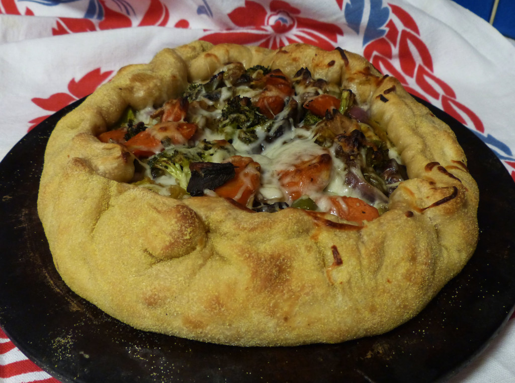 A new favorite in our house: roasted veggies in a pizza crust