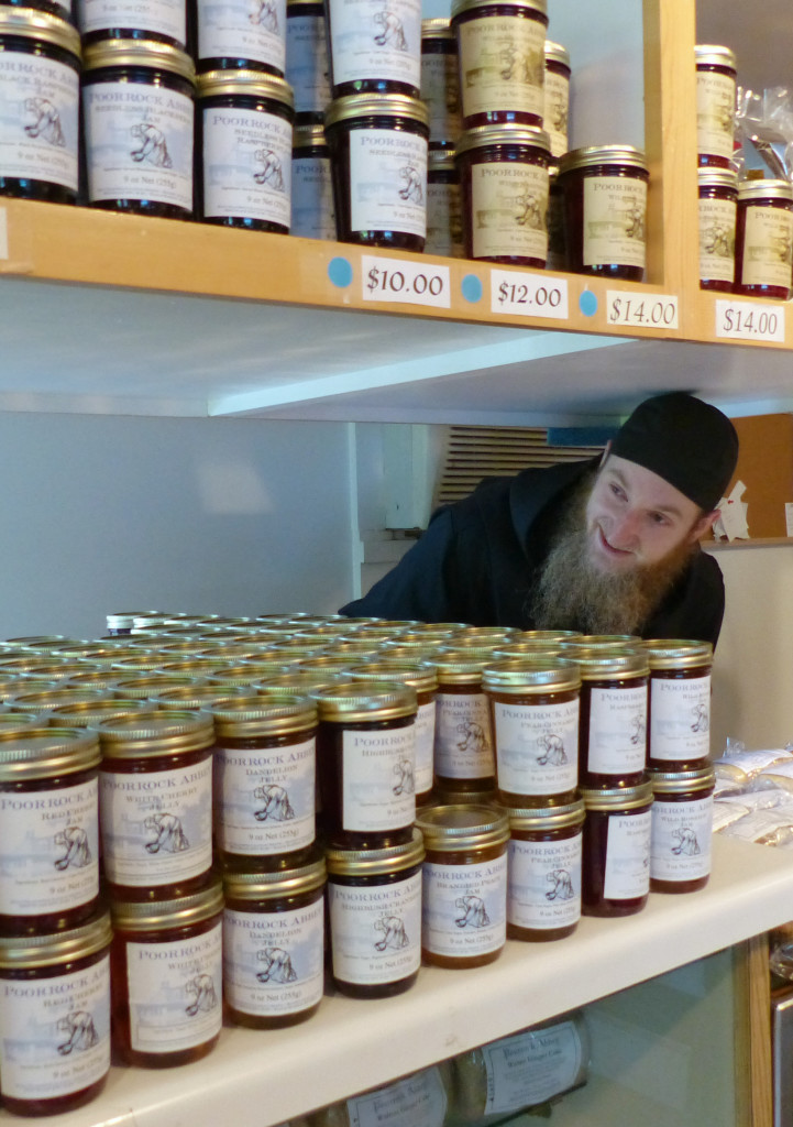 A brother overlooks jars of the fruit of the monks' labor at the Jampot in the Keweenaw Peninsula.