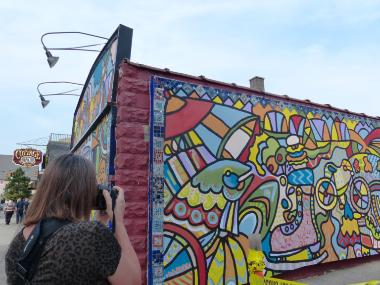 Andee Rudloff covered The Cottage Bar & Restaurant with a colorful mural for ArtPrize